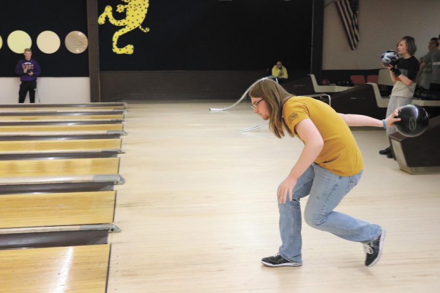 Senior Alec Welte gets into his bowling stance. The unified bowling team practiced Tuesdays after school at Leopard Lanes. “It’s just something I like to do for fun; it isn’t that challenging. I have been doing it for quite a while now,” Welte said. Photo by Cora Bennet