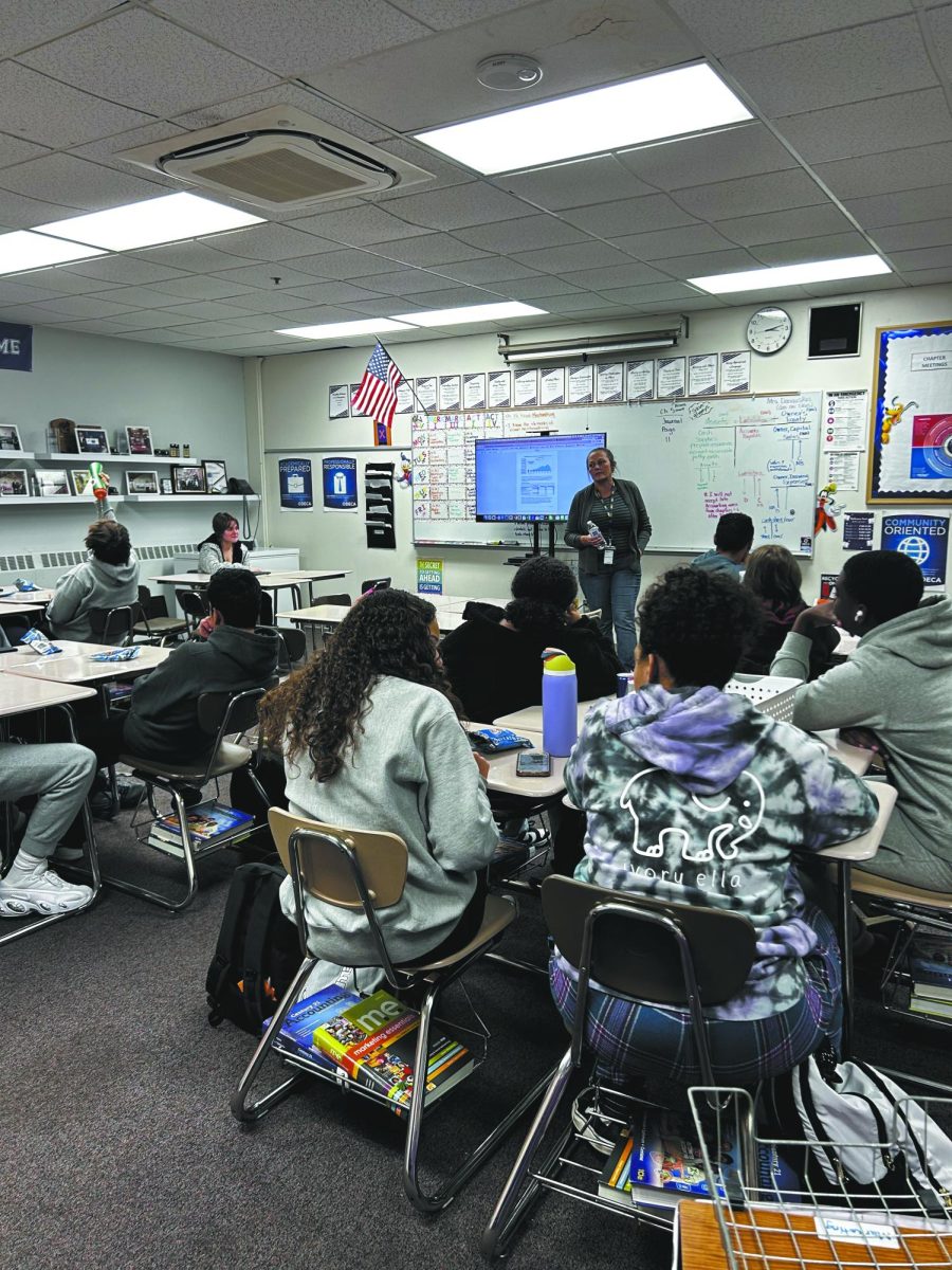 Real life lessons. In class, the City of Bellevue Water and Sewer department superintendent gave a presentation. It was to educate students on how the city offices ran, and how businesses functioned within them.  “We surprised them by giving them a token from our DECA chapter,” DECA adviser Dawn Danauskas said.