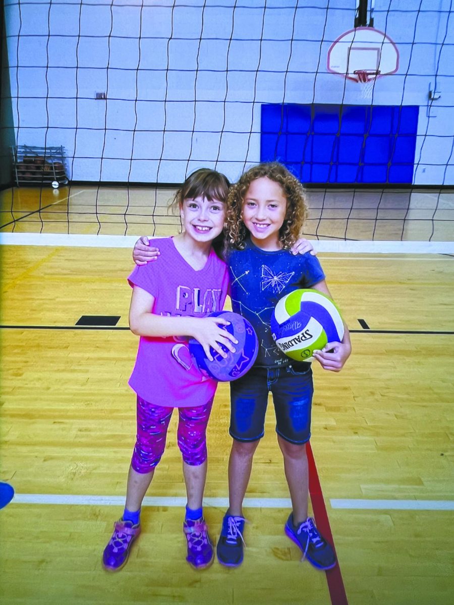 Starting young. From the age of 6, freshman Grace Rued (Left) started playing volleyball with her childhood best friend. Little did she know, she’d one day go on to play for the varsity team as a freshman student at Bellevue East High School. “My mom just kind of put me in volleyball with my best friend, and I have now been playing for 5 years ever since,“ Rued said. “We are still friends now.” Photo courtesy of Grace Rued