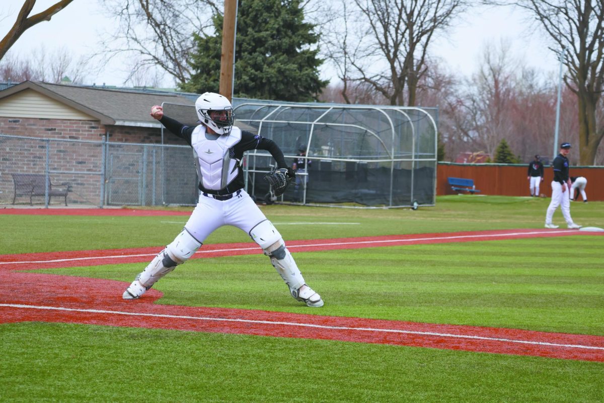 Play ball. On March 22, 2025, at an away game against Elkhorn, sophomore Ethan Greenwell moves to throw the ball to one of his teammates. During games, when playing as the catcher, Greenwell works one on one with the pitchers. “I do my best to be a leader out there, especially with the pitchers, make sure they’re relaxed the entire time and just do my job to the best of my ability,” Greenwell said.